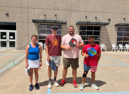 Lisa and Dave Anderson (left) defeated Isaac Boone and Dylan Knight to win the pickleball tourney. Courtesy photo