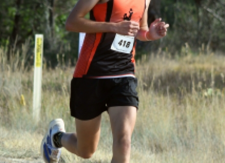 Monticello junior Eli Carling prepares to start the long, rocky descent to the finish line during the Bayfield, CO Invitational August 22. Carling was one of only two boys to break the 19-minute mark, taking second overall behind Pagosa Springs’s Rylan Ash. Joel Priest photo