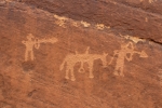 A shootout with guns, horses and bows and arrows, is captured in an historic petroglyph along the San Juan River. See more photos at sjrnews.com. Courtesy photo