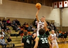 Monticello sophomore Kord Young (#12) rises for a shot over Bryce Valley defenders on December 12 as junior Tristan Felix (#22) looks on. The Buckaroos suffered an 83-58 loss in the game but look to rebound against Dove Creek this week. Anna Fredericks photo