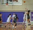 Whitehorse's Kerri Martin puts up a shot contested by Monument Valley's Dakotah Cly. Lee Ke photo